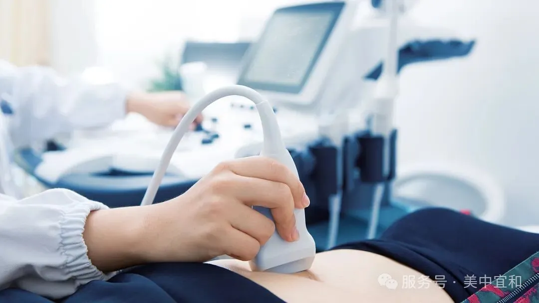 Pelvic ultrasound screening in a gynecology examination room